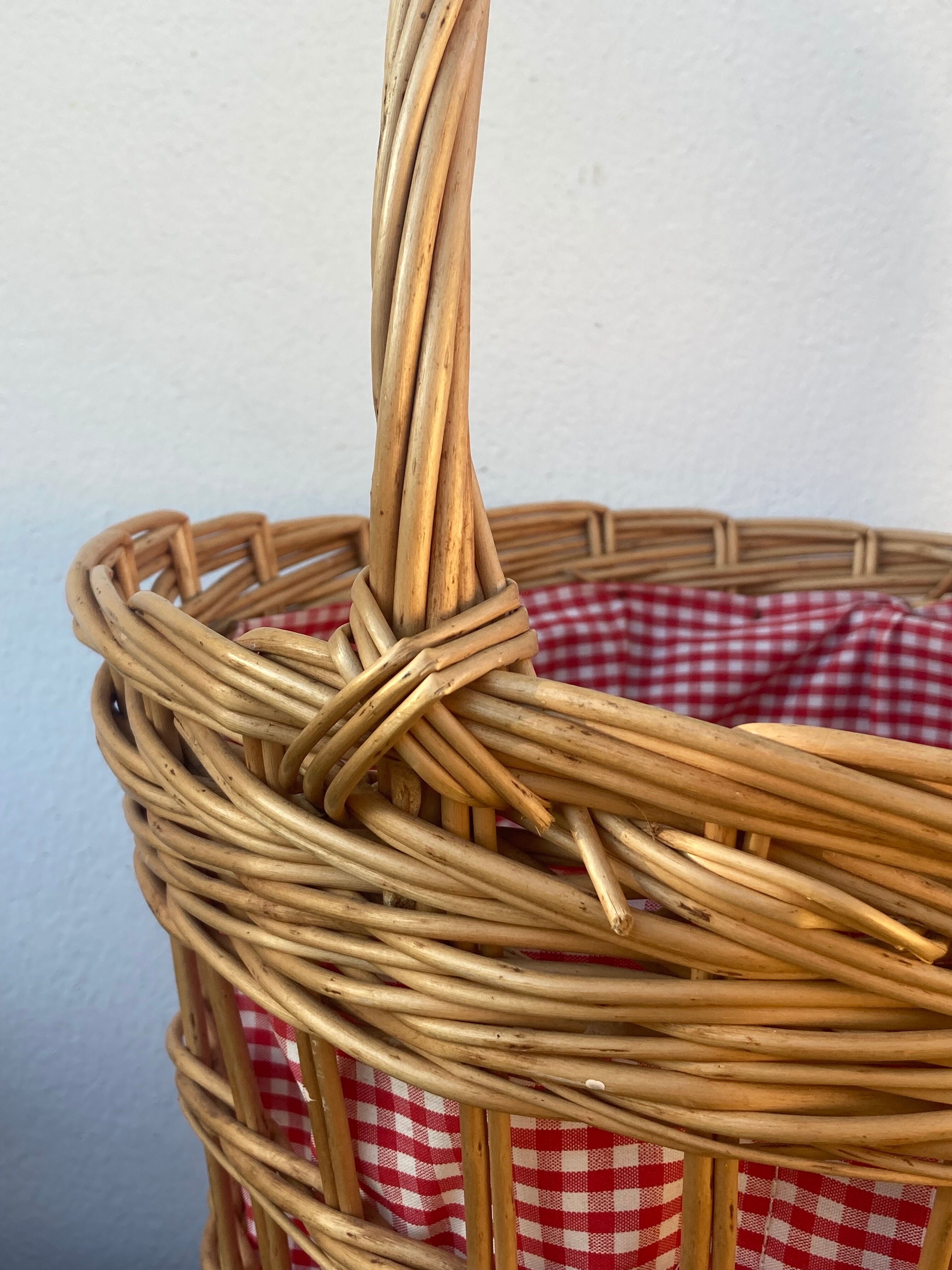 Basket in vintage woven wicker and red gingham