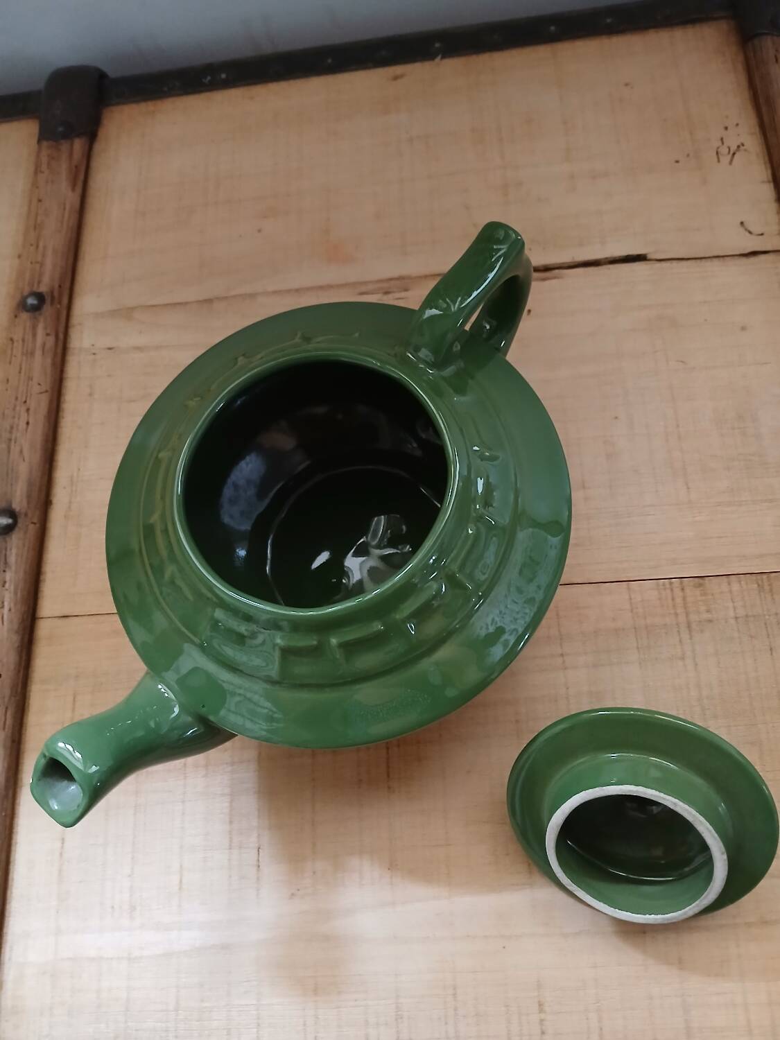 Green earthenware teapot