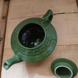 Green earthenware teapot