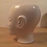 2 black and white ceramic head vases, face