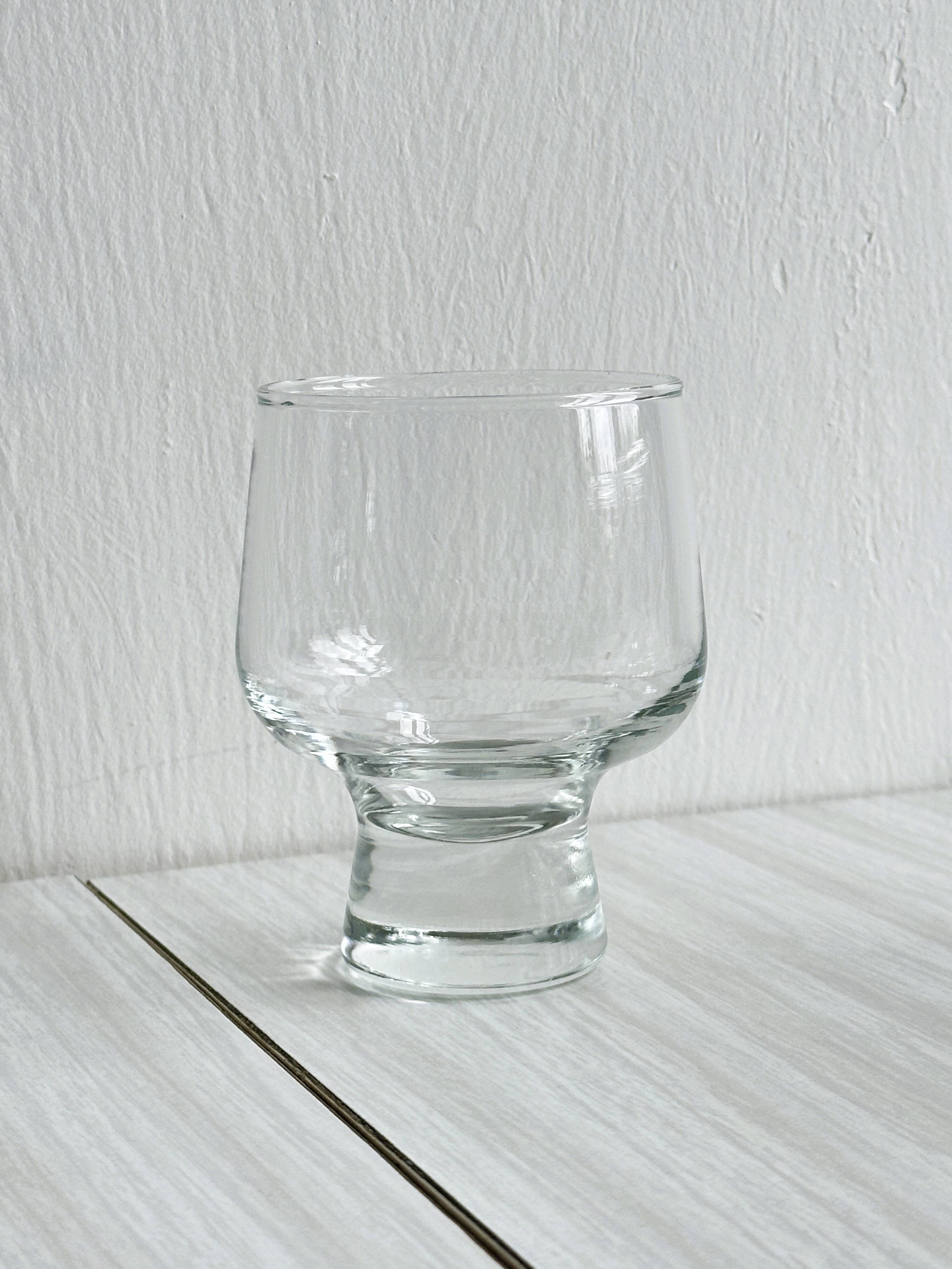 5 thick glass water glasses.