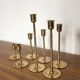 Series of 7 Scandinavian brass candlesticks