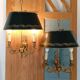 Pair of bronze and sheet metal hot water bottle wall lights