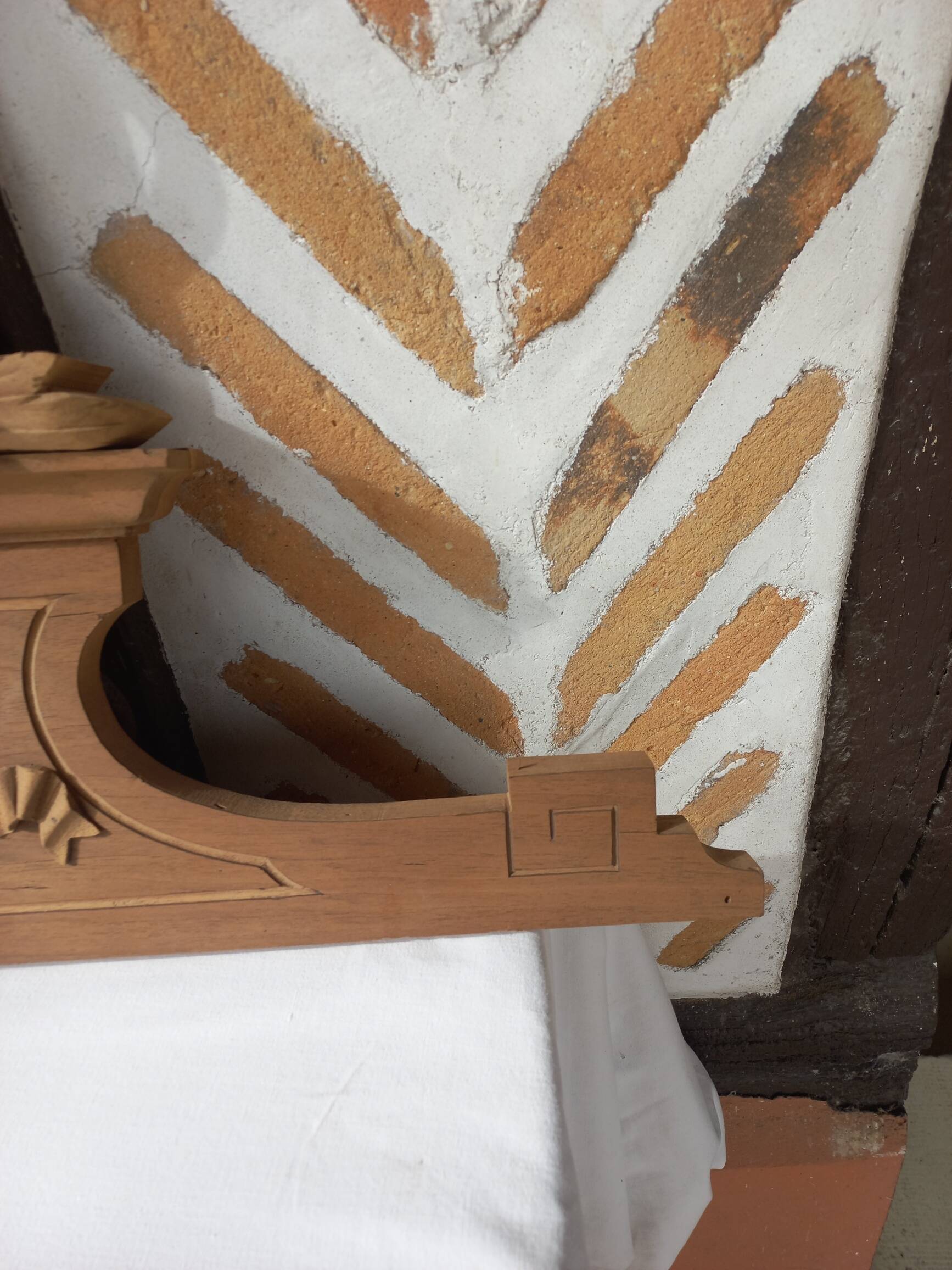 Old sandblasted wooden pediment