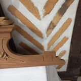 Old sandblasted wooden pediment