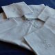 Lot d'un service de table comprenant une nappe et 6 serviettes