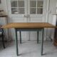 Table, vintage desk with smoked green legs, oak top.