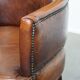 Amazing cognac-coloured sheepskin dining/side chair with armrests