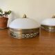 Pair of antique half-spherical ceiling sconces in white glass and brass.
