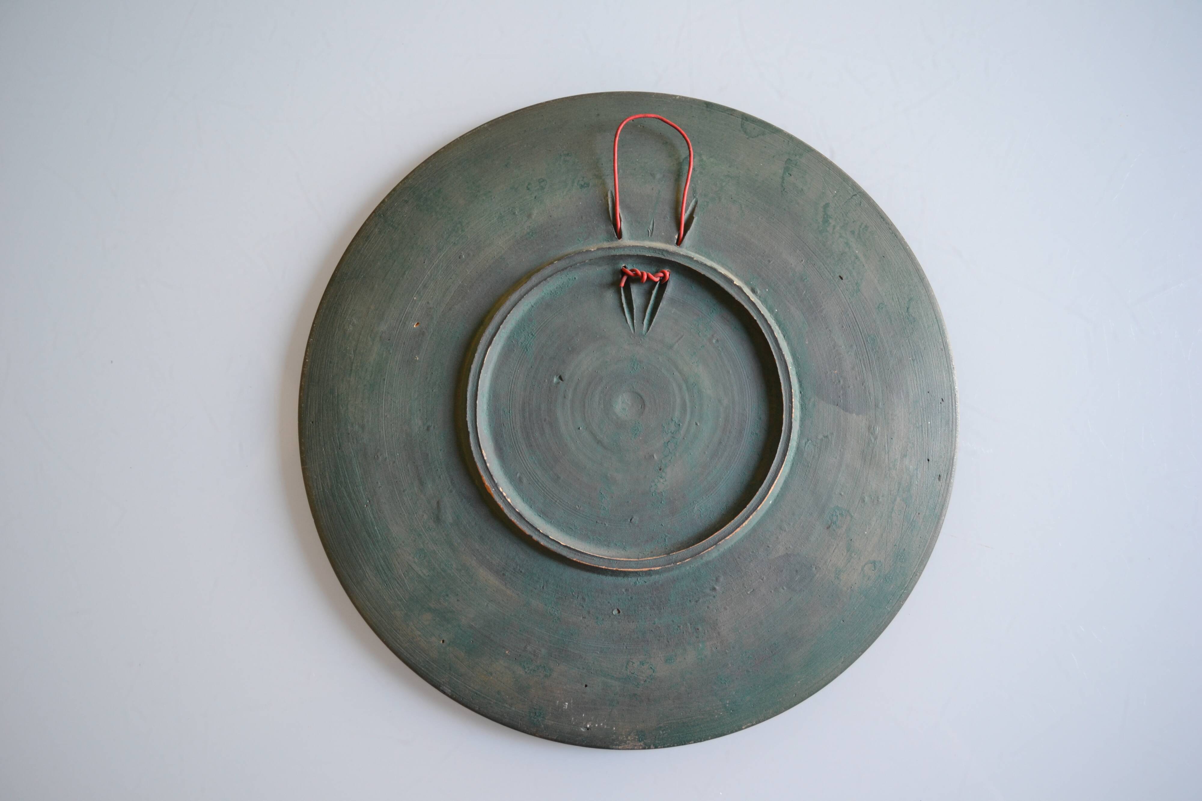 Ceramic wall plate attributed to Wim Mühlendyk