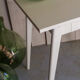 White compass feet table