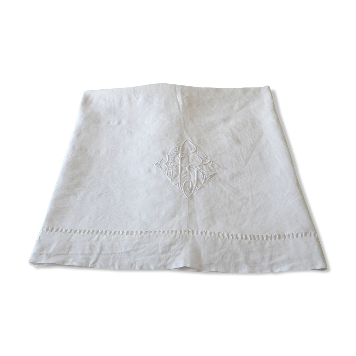 White sheet in monogrammed linen