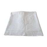 White sheet in monogrammed linen