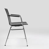 Mid-century modern black design chair in with armrests, Belgium