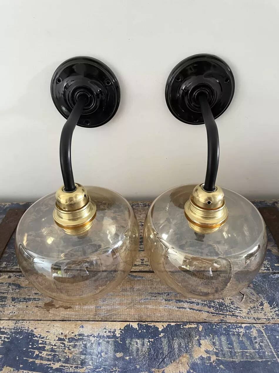 Pair of gold globe wall sconces