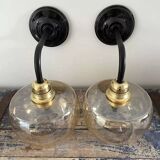 Pair of gold globe wall sconces
