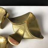 Suite of three bronze "ray"