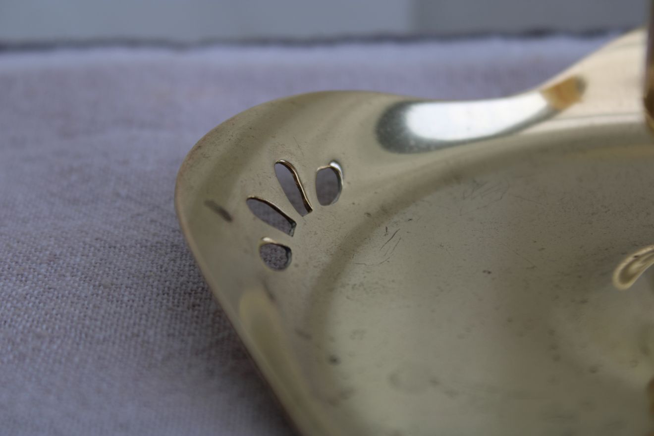 Golden brass candle holder