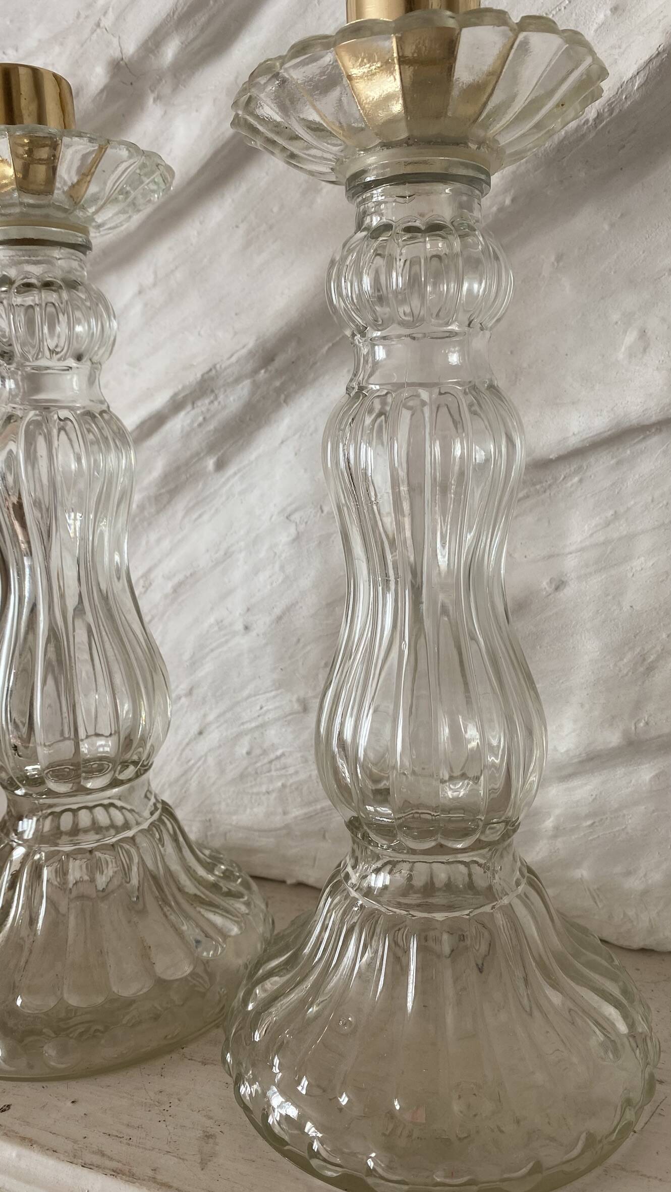 Paire de bougeoirs en verre flacons roger gallet