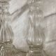 Paire de bougeoirs en verre flacons roger gallet