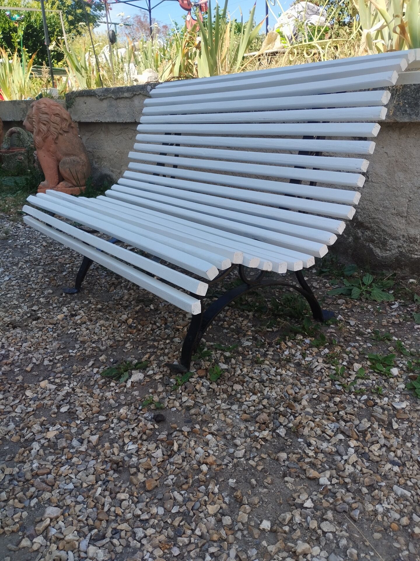 Antique garden bench with cast iron legs