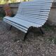 Antique garden bench with cast iron legs