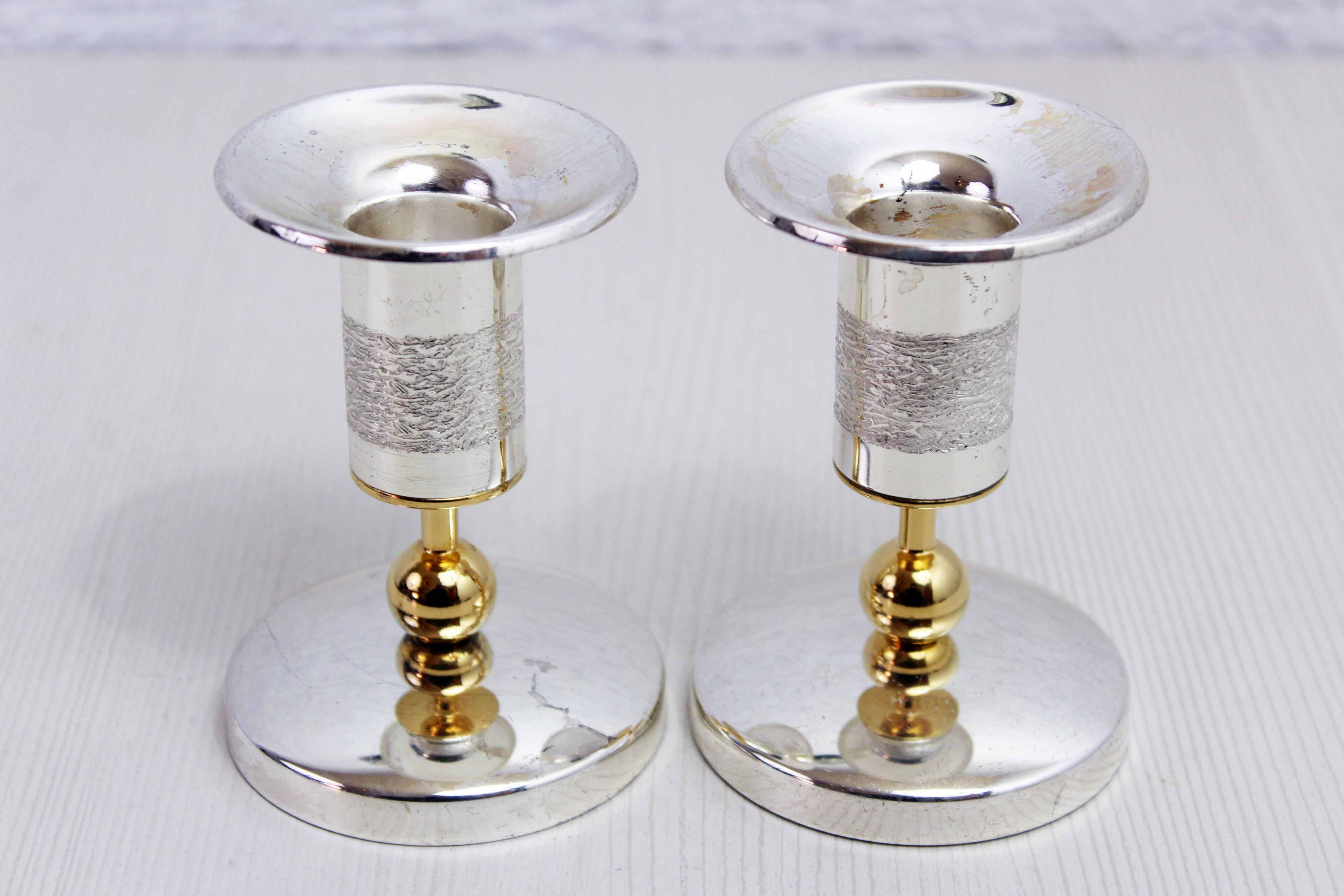 Pair of silver metal candlesticks