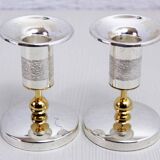 Pair of silver metal candlesticks
