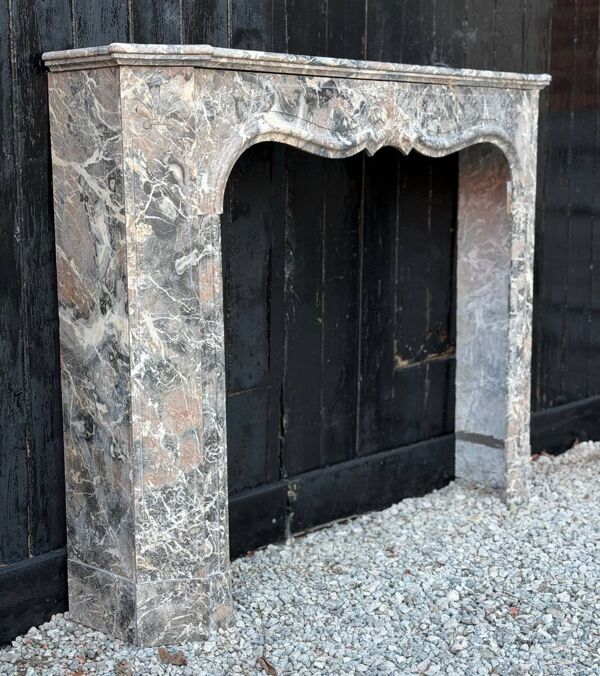 Cheminée de style régence en marbre gris des Ardennes vers 1900