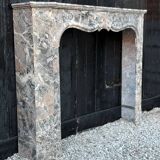 Regency-style fireplace in grey Ardennes marble from around 1900.