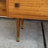 Mid-century brown teak chest of drawers with three drawers, tapered legs from the 1960s.