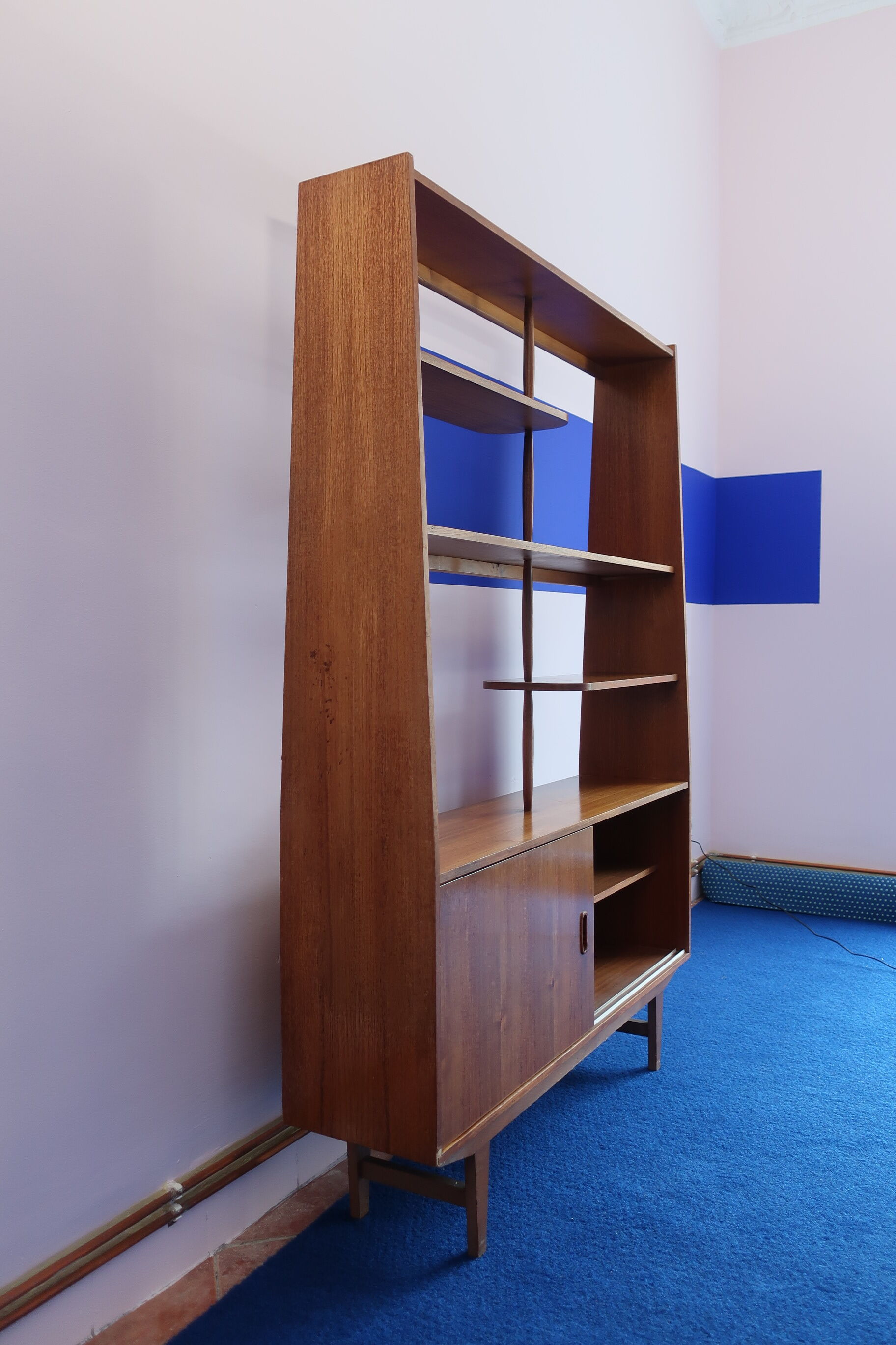 Library separator of 60s teak pieces
