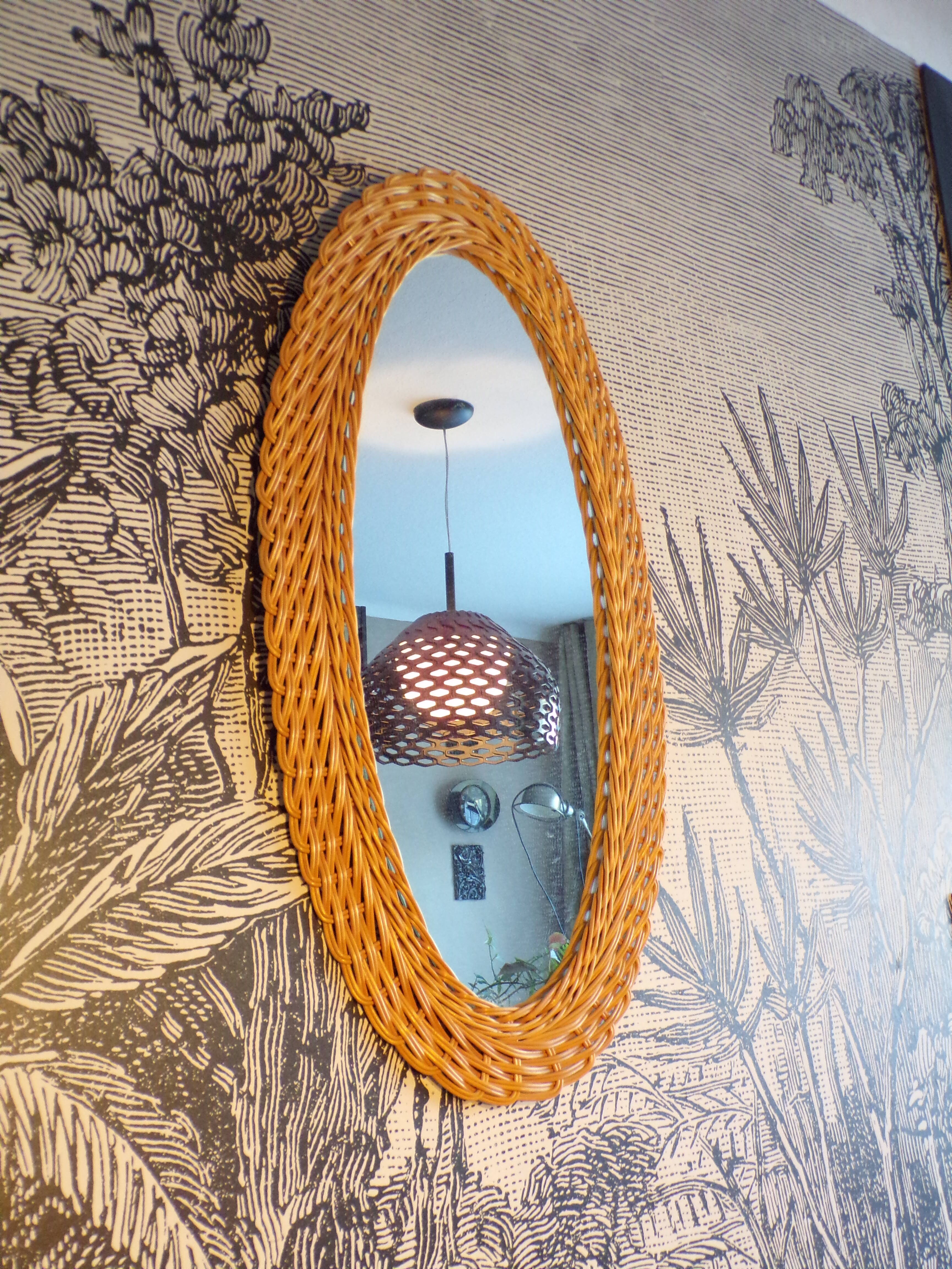 Oval rattan mirror