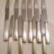 Set of 6 table knives & 4 fruit/cheese knives in world-class silver