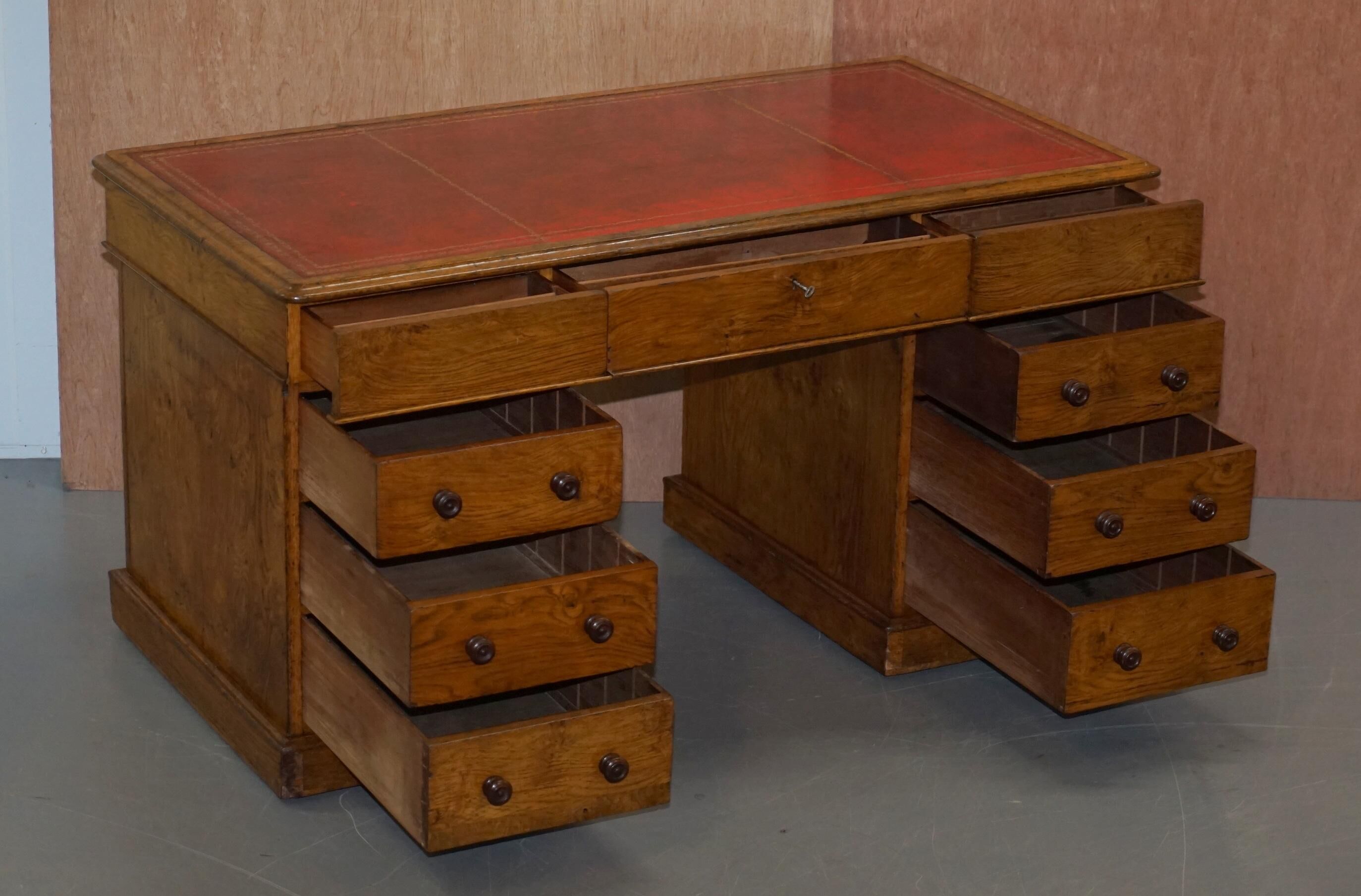 Rare oak partner's desk by Howard & Sons circa 1880 with leather.