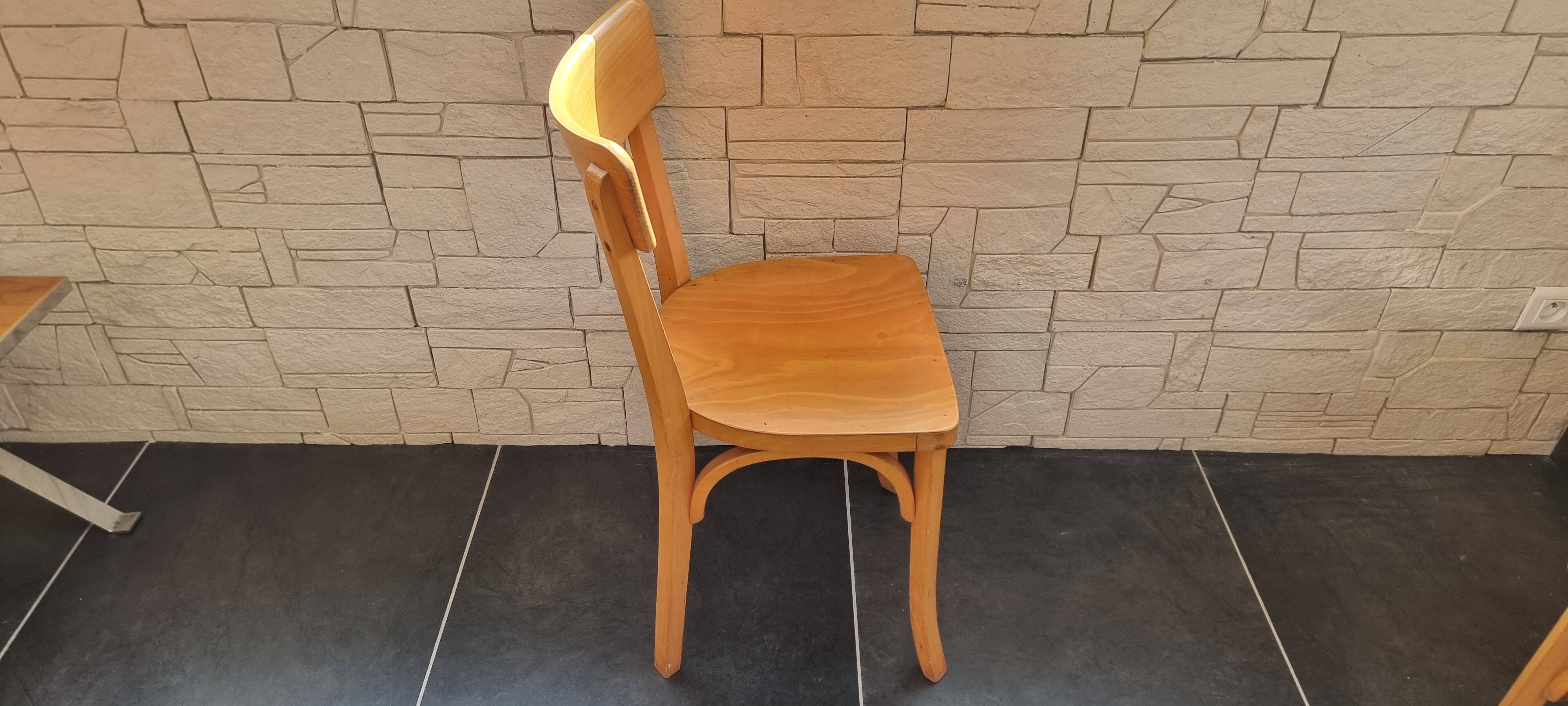 Set of 4 bistro chairs by A. Cartier, 1957