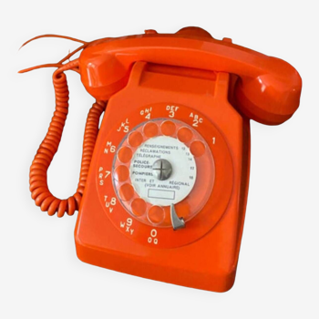 Orange rotary telephone