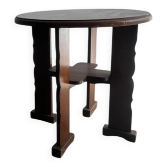 Table d'appoint ronde brutaliste en bois massif brun foncé, vers 1970, de forme sculpturale