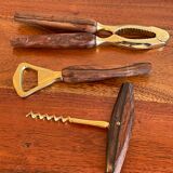 Bottle opener made of teak wood, corkscrew and nutcracker