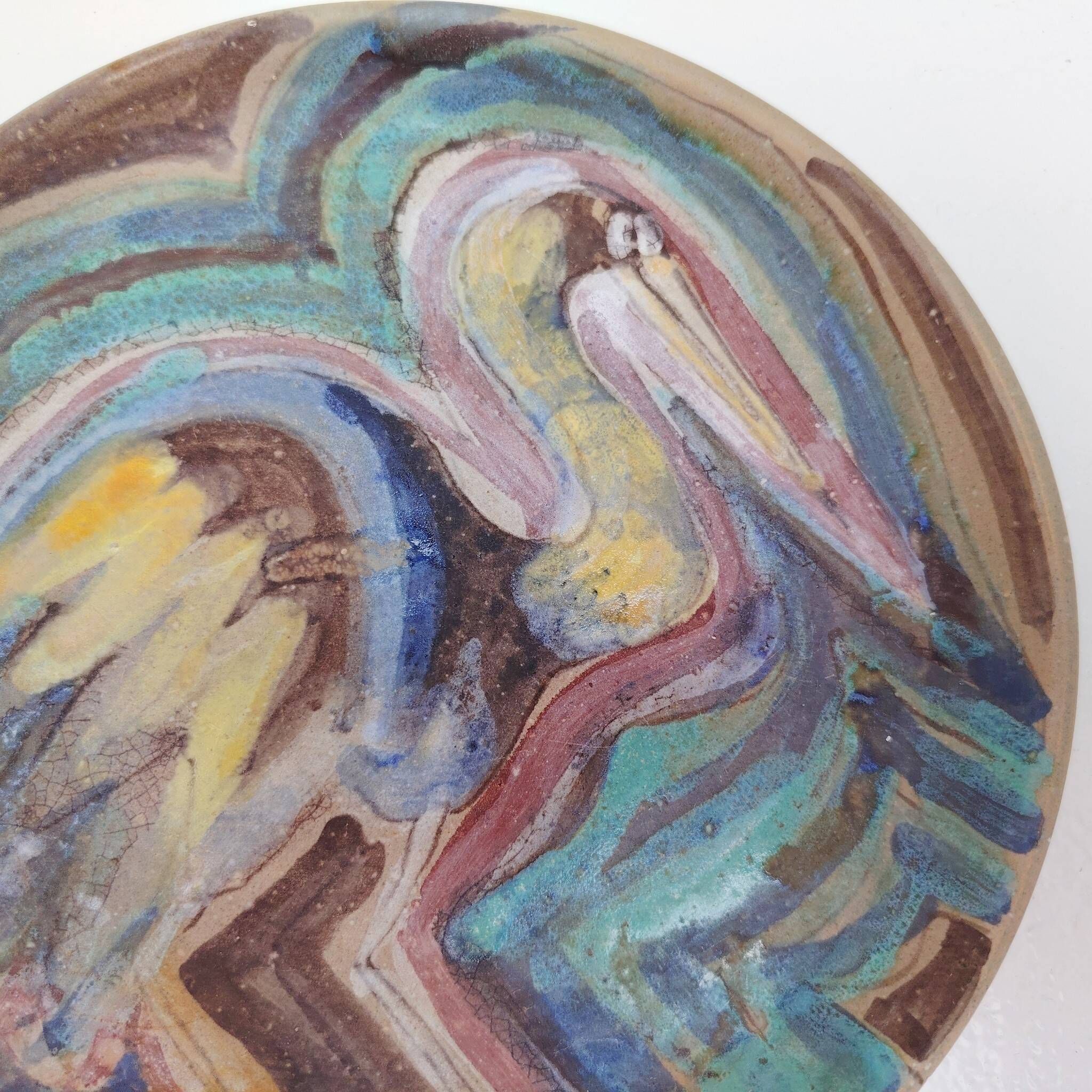 Ceramic plate with a bird, signed, vintage