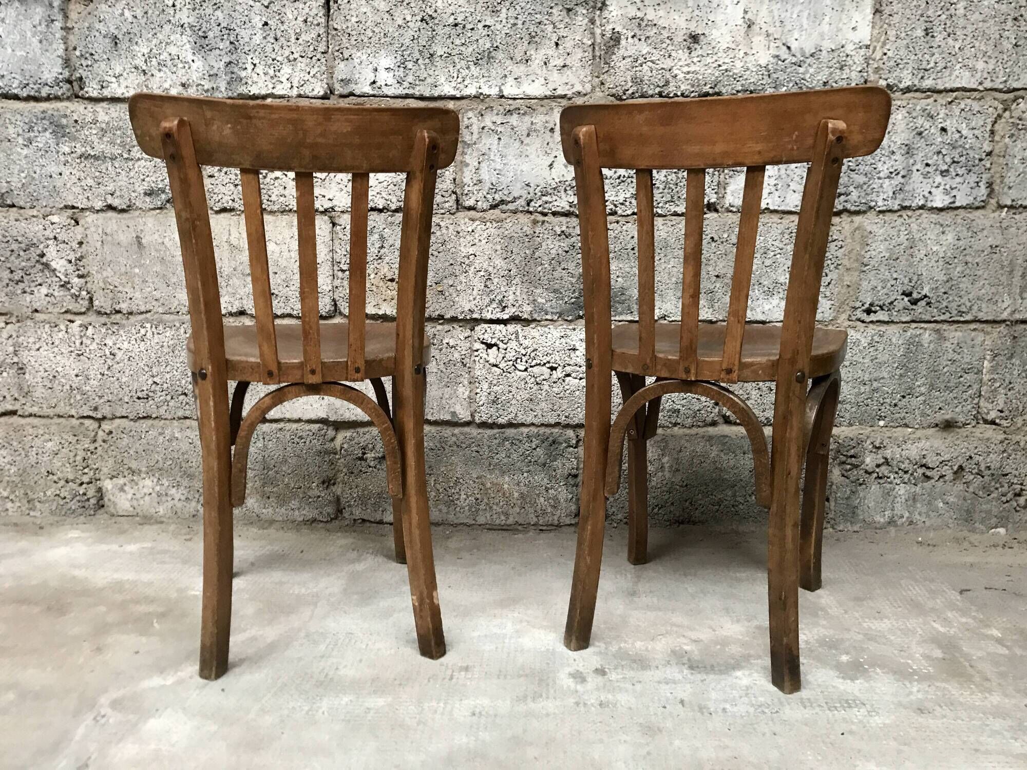 Pair of bistro chairs troquet Parisien in curved wood 1950