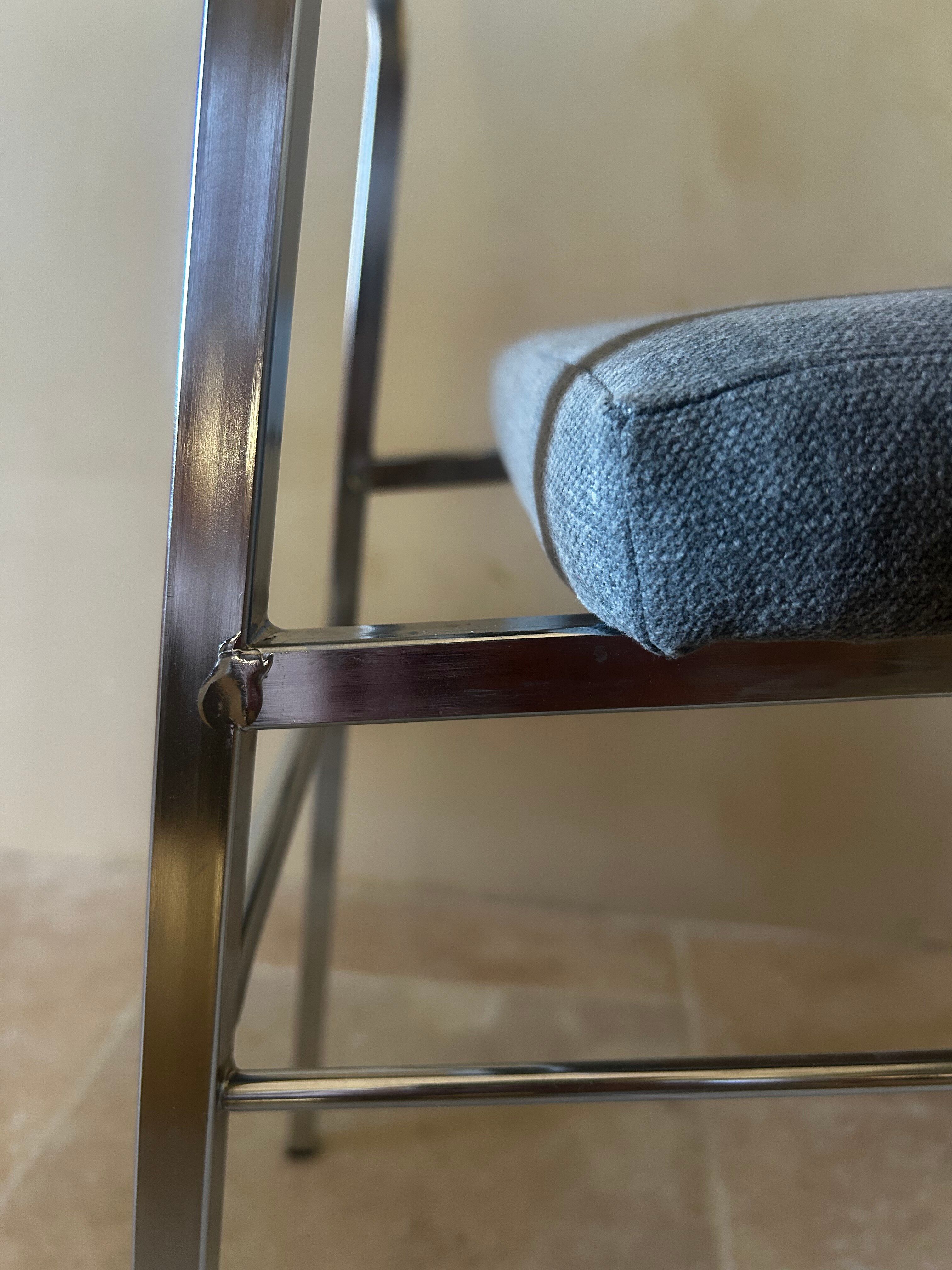 Pair of chrome and fabric chairs