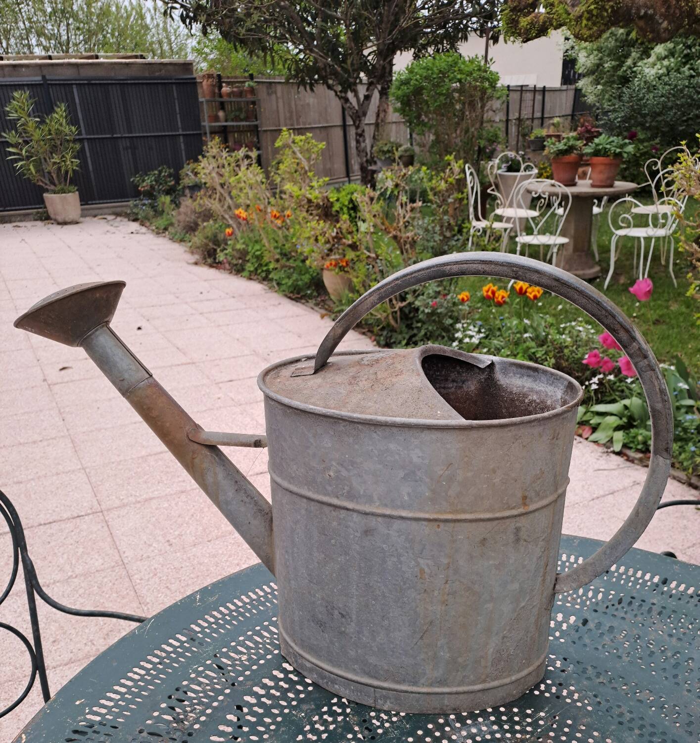 Old zinc watering can