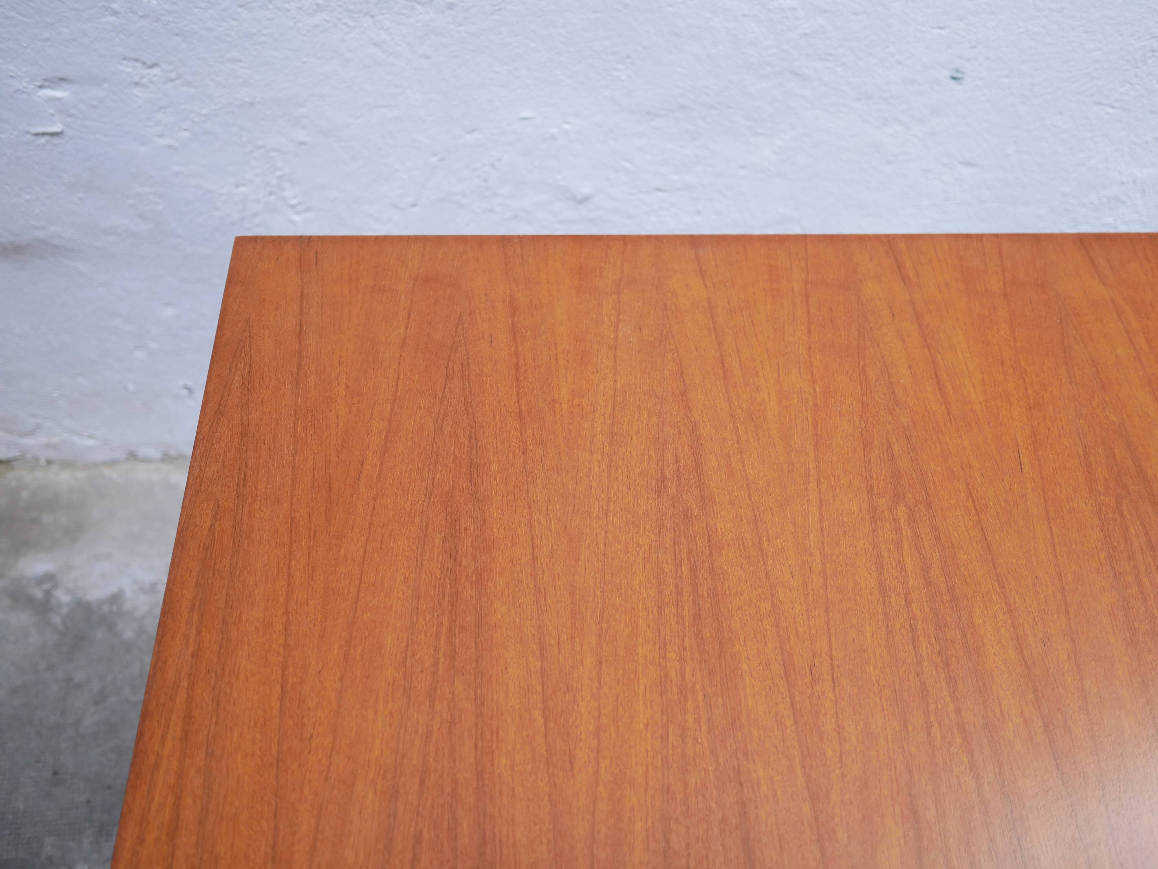 Extendable teak dining table by Gérard Guermonprez for Magnani editions
