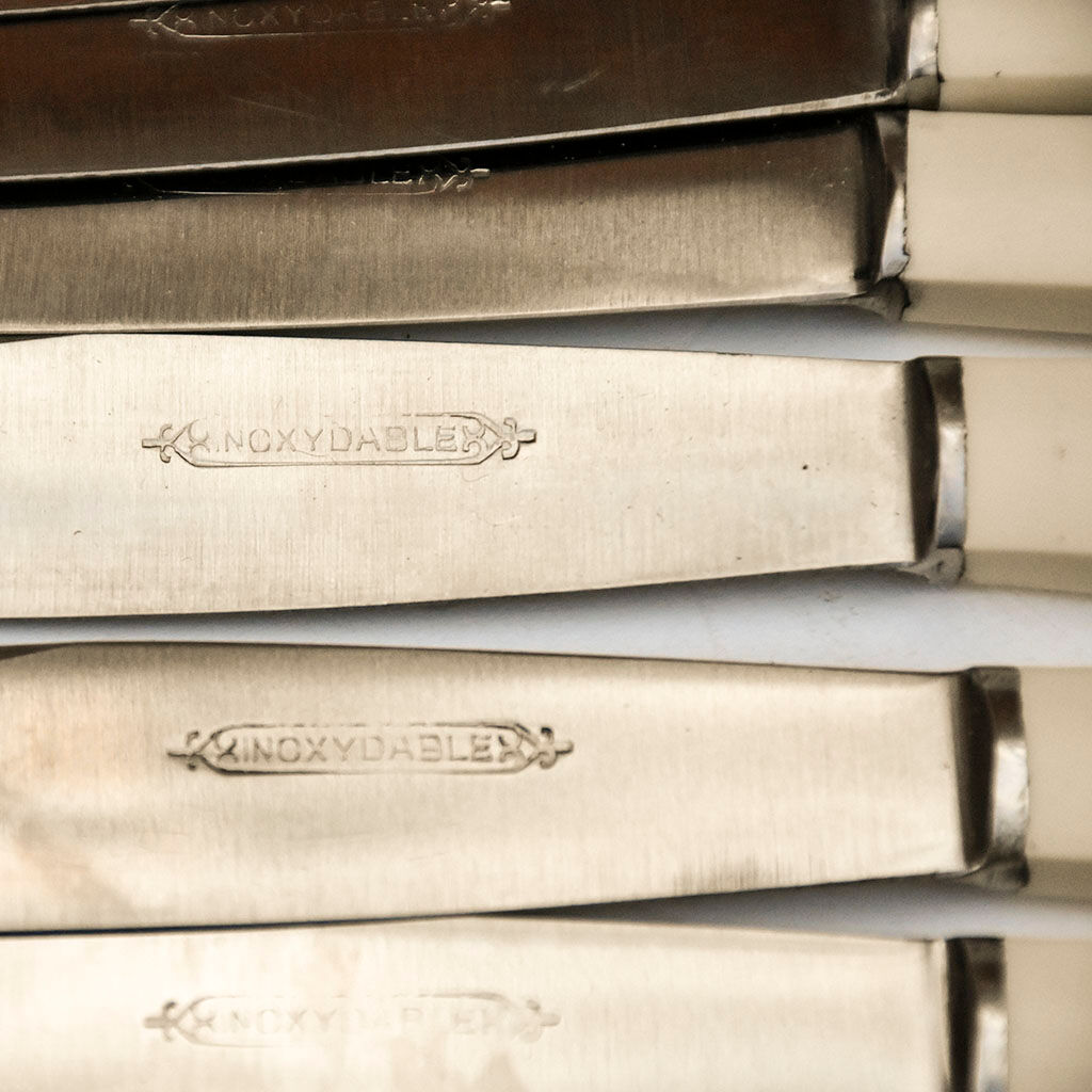 Lot 12 steel knives old vintage white sleeve