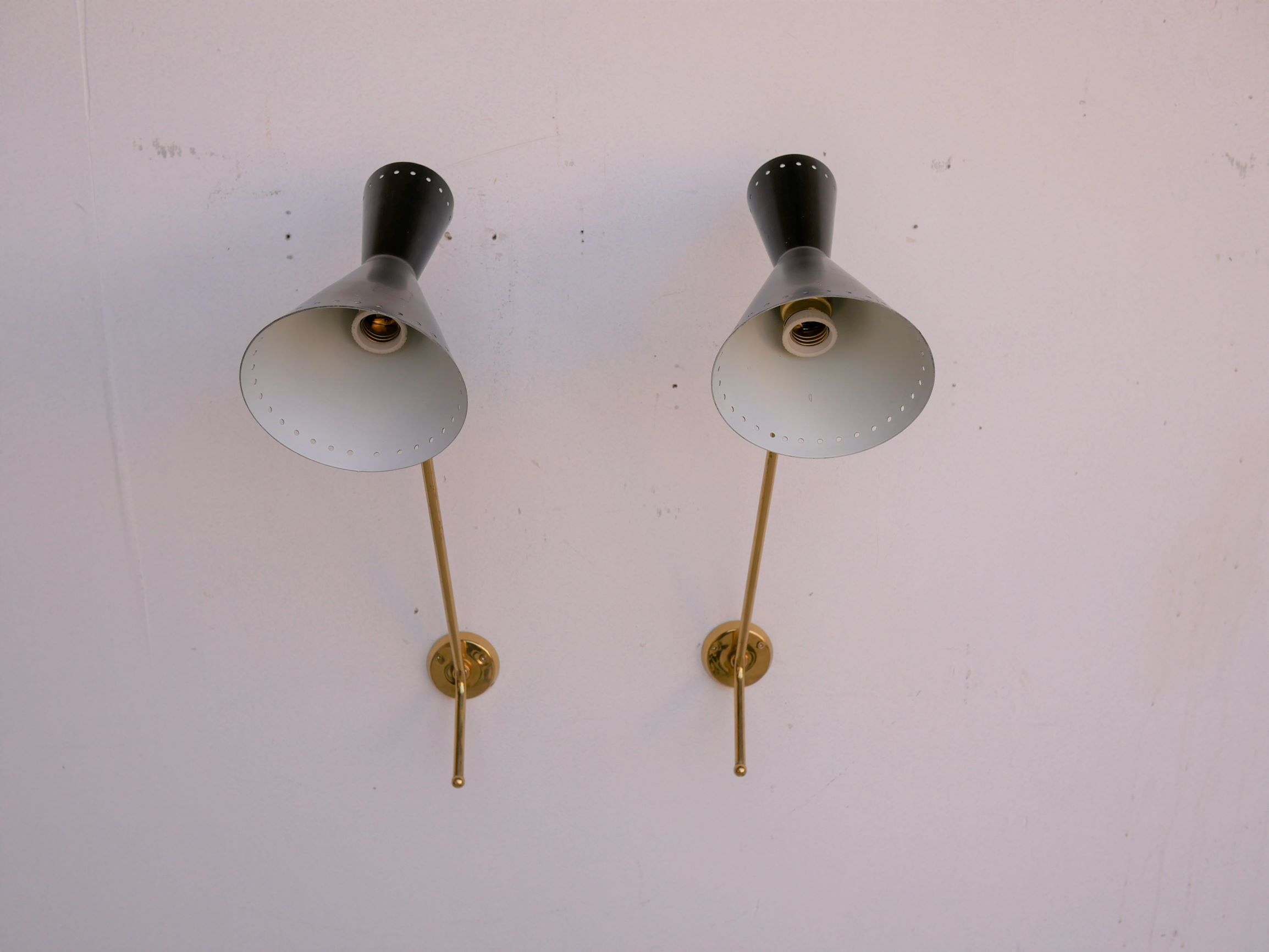 Vintage "Diabolo" wall apply in black metal and brass