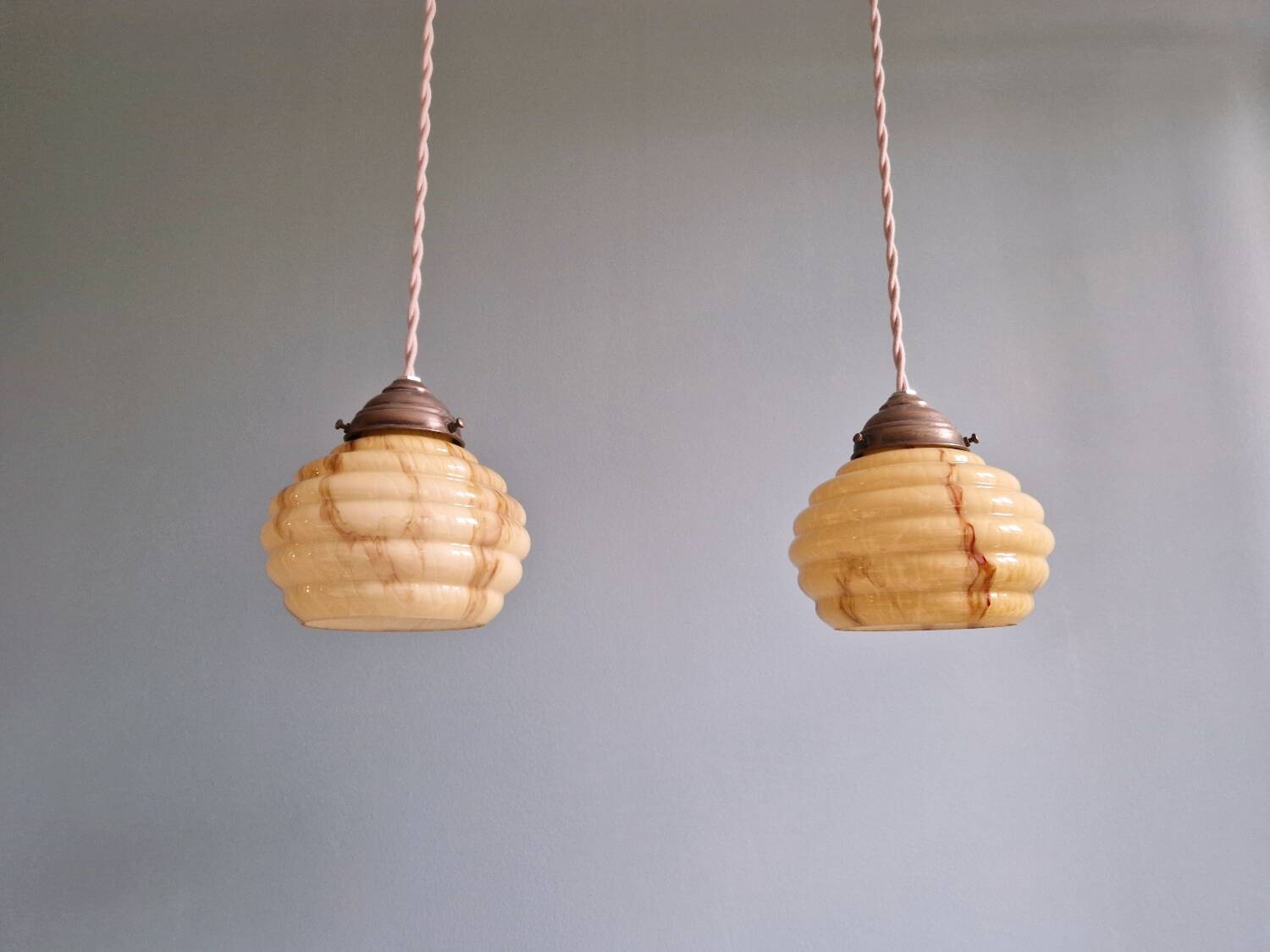Pair of Art Deco marbled opaline pendant lights, 1920s-30s
