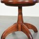 Set of 2 swivel/office chairs with a cognac-coloured cow leather seat