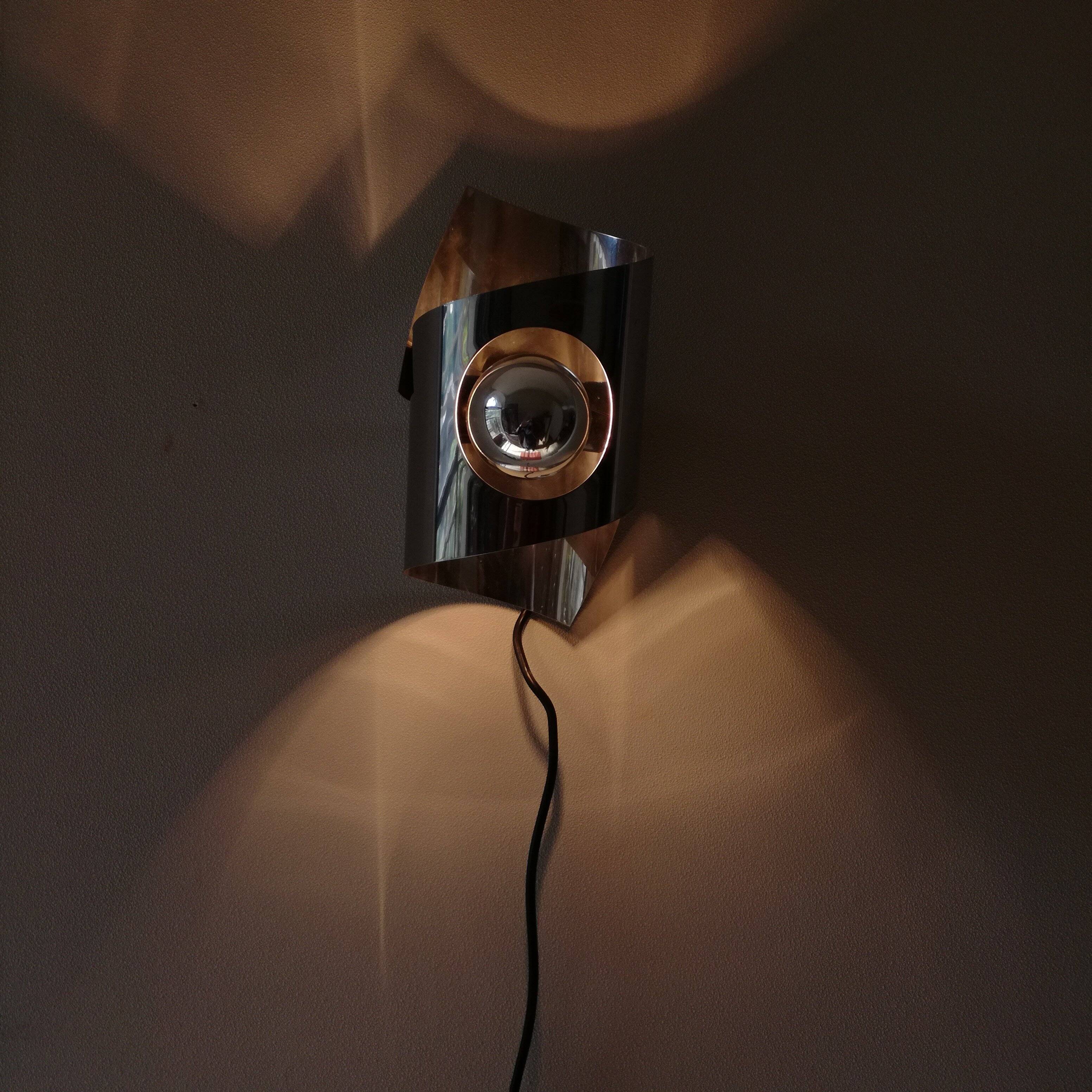 Space Age polished stainless steel wall light from the 1970s