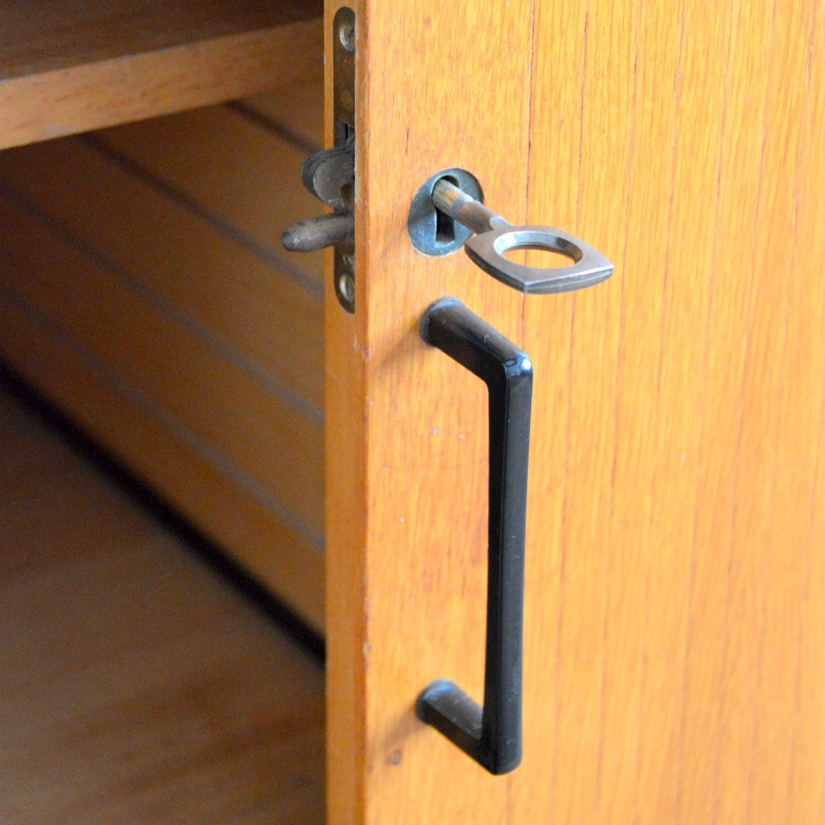 Storage cabinet with sliding curtain shutter 1950s